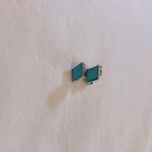 Diamond shaped stud earrings with turquoise stone.